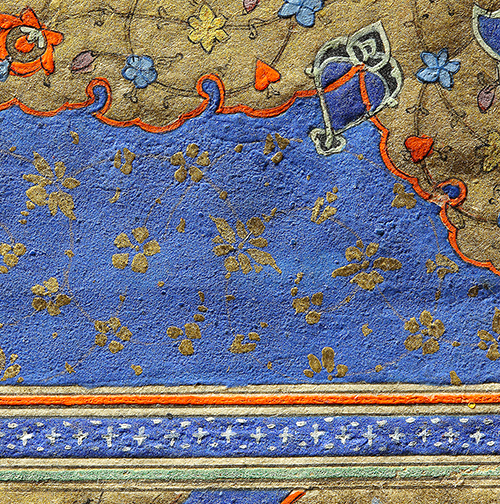 A portion of an illuminated manuscript painted in blue and gold