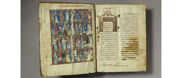 The frontispiece of a Greek illuminated manuscript - the left page shows a detailed painting. A blue background with fours rows depicting different groups of people. The right page is two columns of text with an ornate decoration at the top