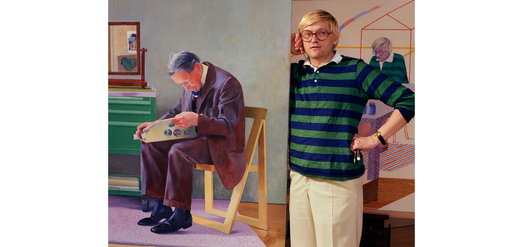 Portrait of David Hockney - a middle aged white man with blonde hair and glasses, wearing a stripey blue and green jumper and cream trousers, standing next to a large painting of an older man reading a newspaper, looking directly at the camera