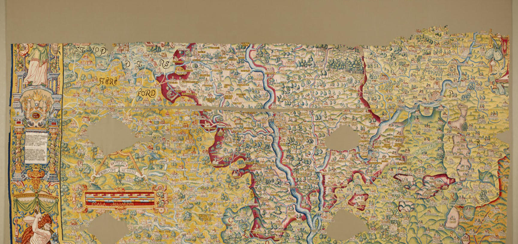 A portion of the tapestry map - showing Worcestershire - there are bright red lines showing the county boundaries and bright yellows and greens