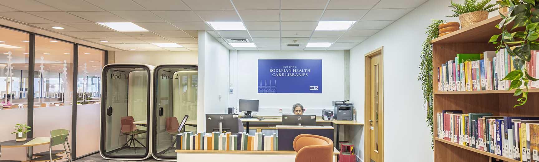 A glass wall and door, with the title Knowledge Centre written on the right pane