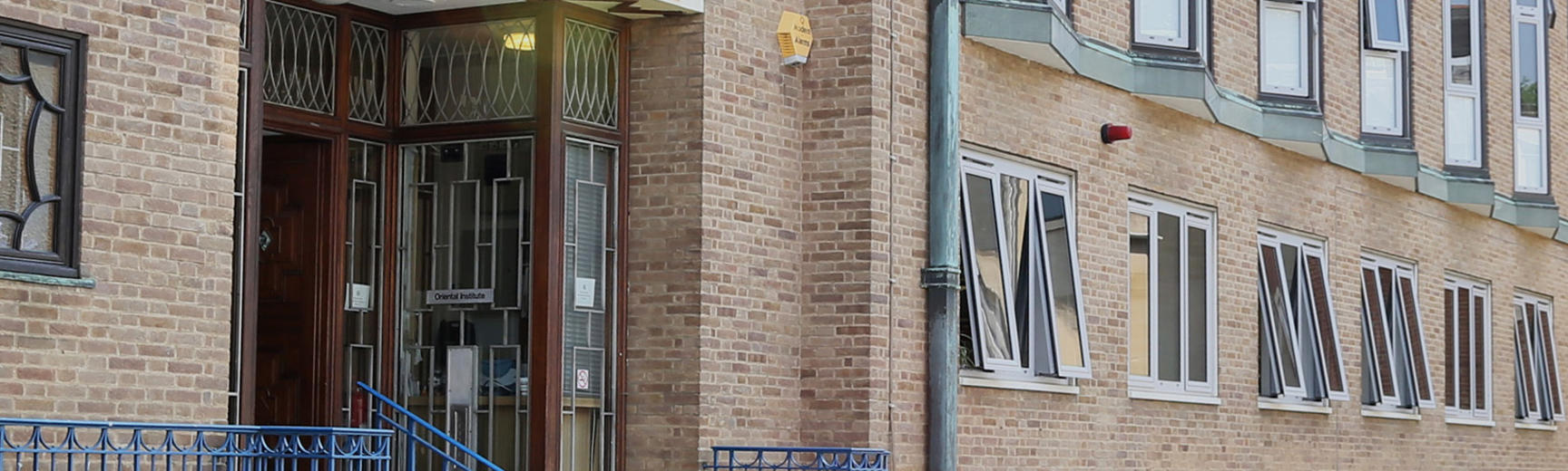 A red brick building with lots of windows