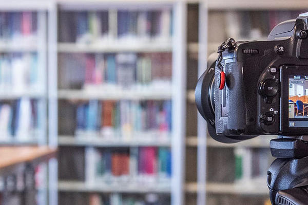 A camera set up to record the inside of a library