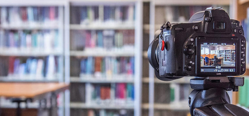 A camera set up to record the inside of a library