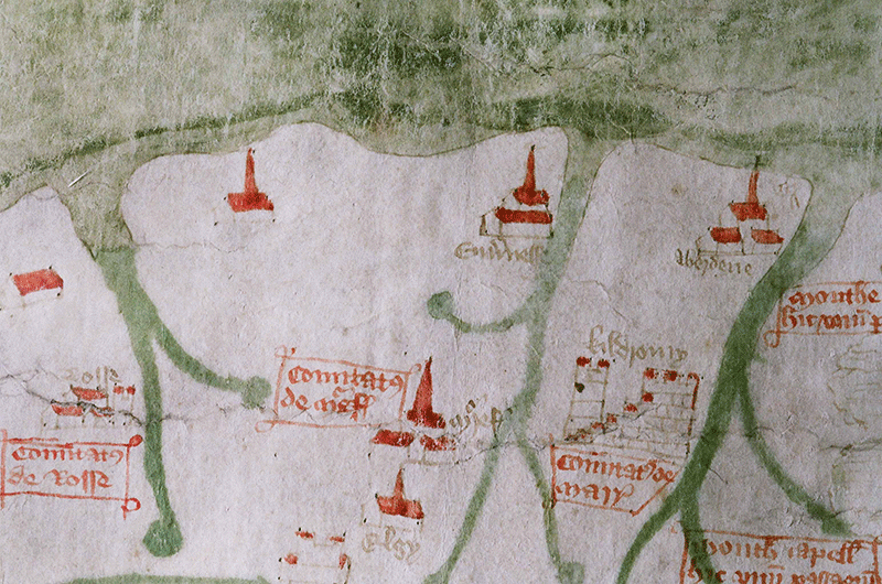 Conservation: Gough Map A detail of the map: at the top is a green area. Three strands of green come down into a beige area. Individual small buildings with red roofs are dotted throughout the remaining area