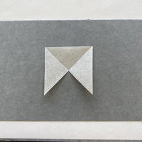 1.6 Style 1: Fixed mounting corners A square piece of paper missing one triangular quarter