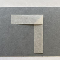 A strip of paper folded at a right angle