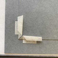3.10 Style 3: Loose mounting corners, "Frog legs" A piece of paper folded into a right angle and fixed with gummed Japanese hinging paper