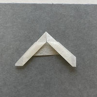 A piece of paper folded into a right angle