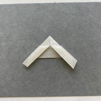 A piece of paper folded into a right angle