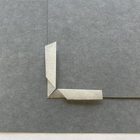 3 .8 Style 3: Loose mounting corners, "Frog legs" A piece of paper folded into a right angle around a gray piece of card